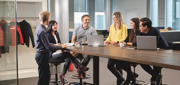 Diverse Group Discussing at a Table